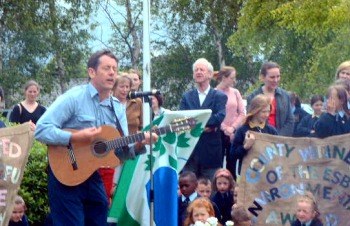 Luka Bloom performs at the Green Flag Ceremony